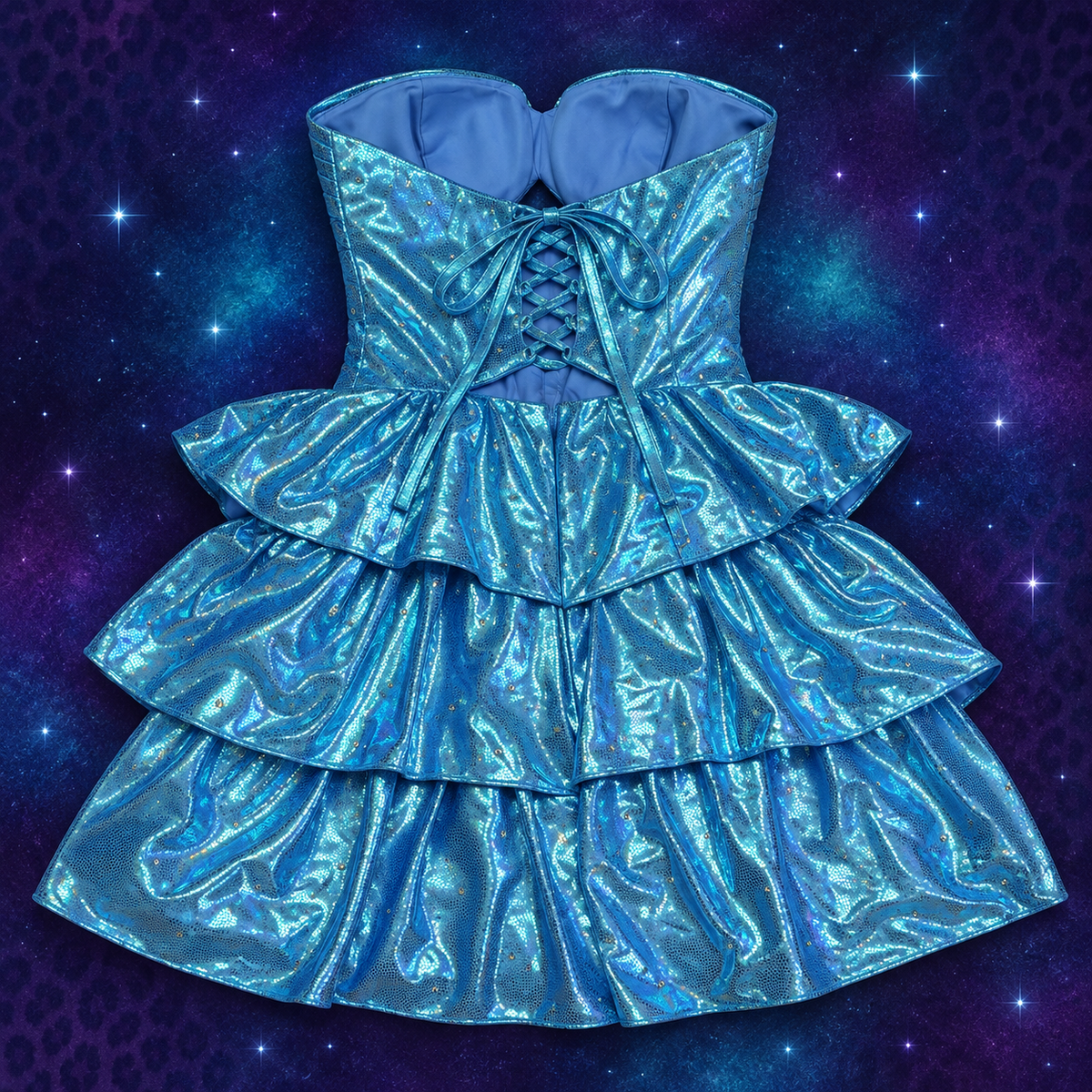 Back of custom turquoise rhinestone lace-up corset mini dress